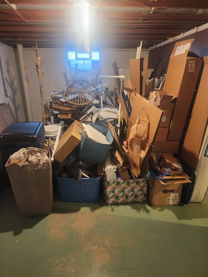 Roll-off dumpster container at job site for 2 Yard Dumpster Rental in Kingman